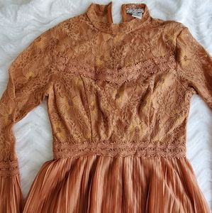 Orange turtleneck blouse top